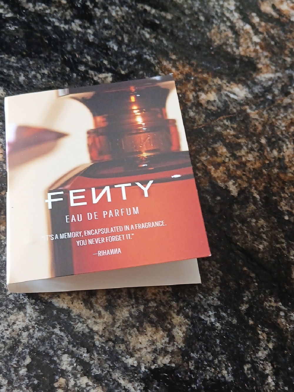 Fenty Beauty Eau de Parfum red and brown sample card